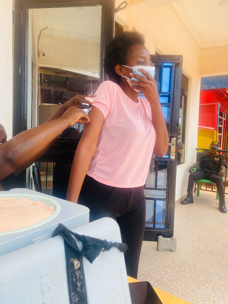 Woman receiving vaccination